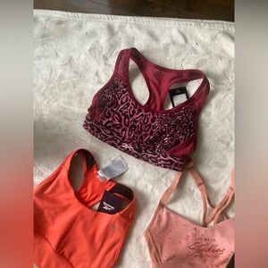 Reebok Women's Burgundy Leopard Sports Bra 45$ each or all 3 for 35$ each.
